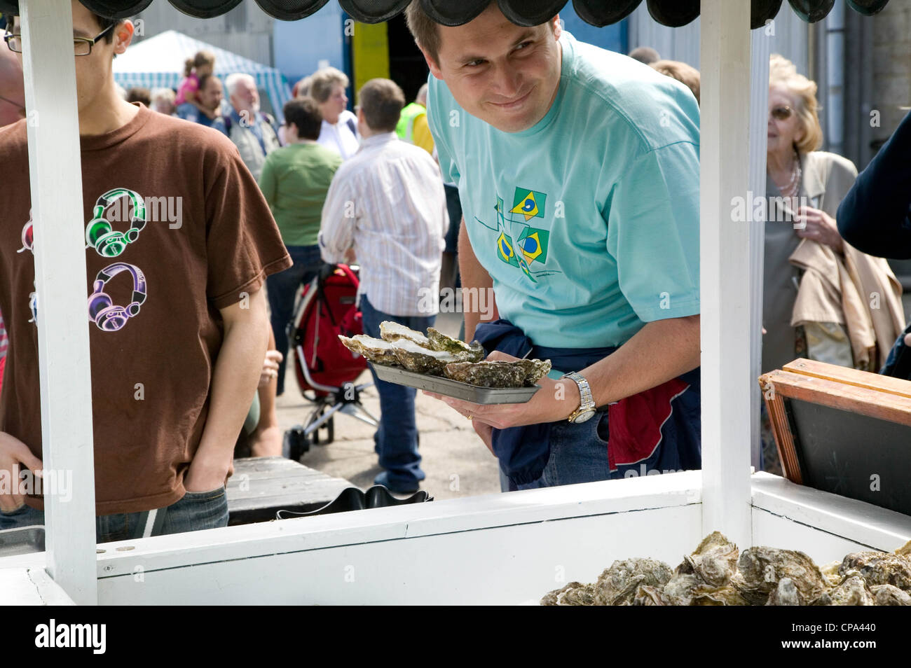 Buying oysters, Whistable Harbour, Kent, England, UK Stock Photo Alamy