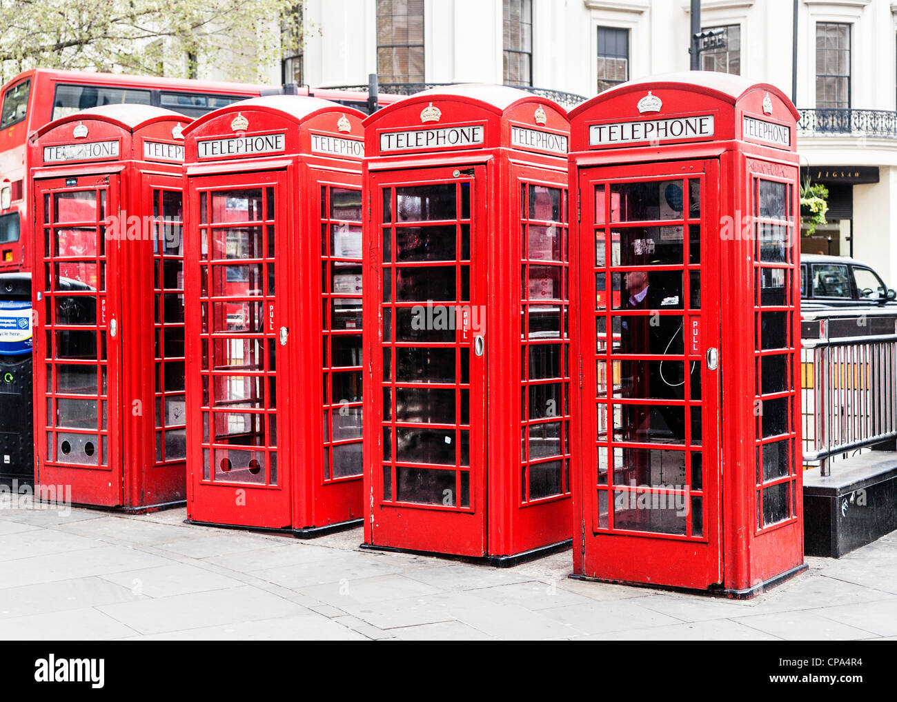 A row of red British telephone kiosks, London, England Stock Photo Alamy