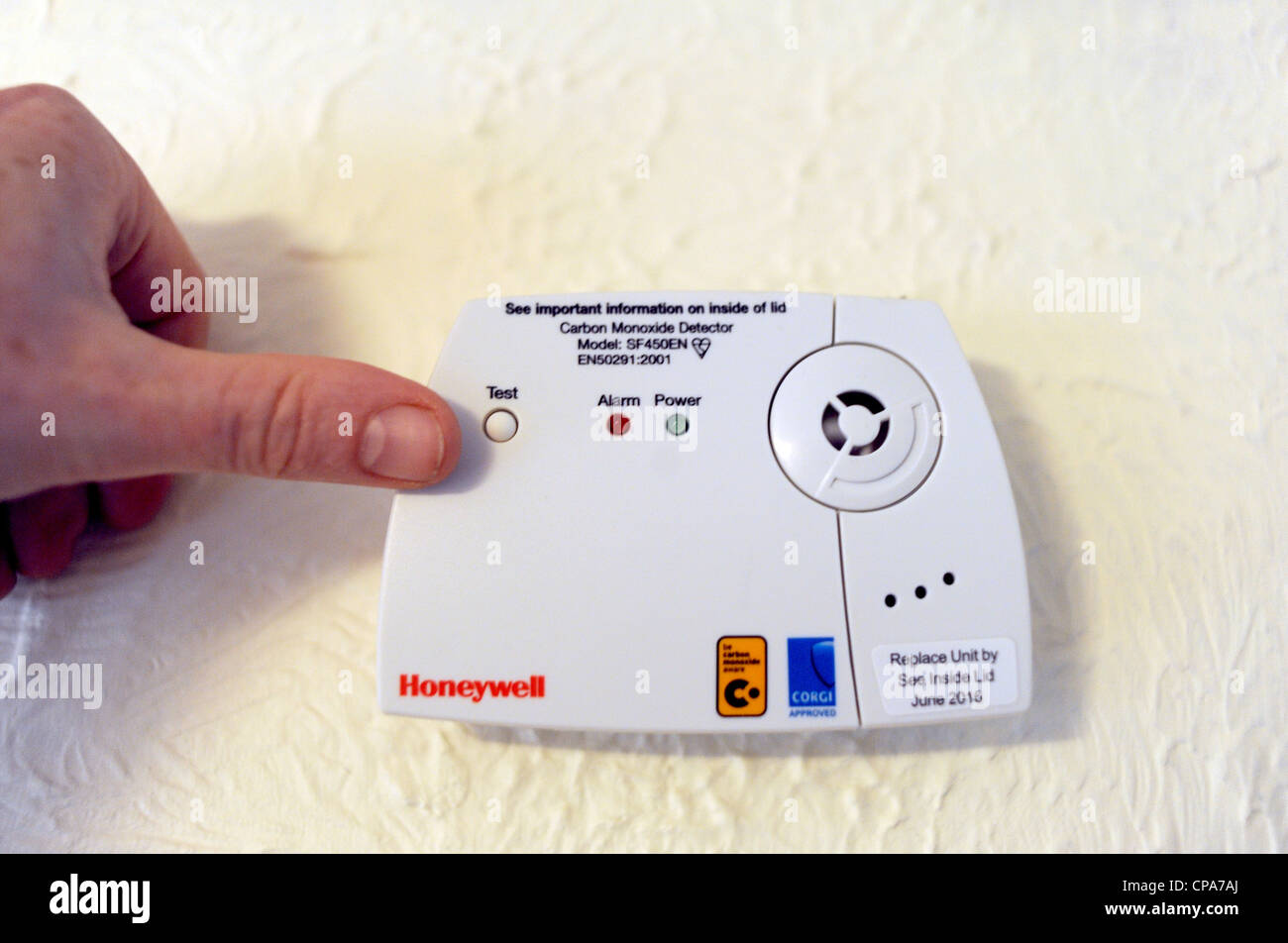 Honeywell Carbon Monoxide detector alarm attached to wall Stock Photo