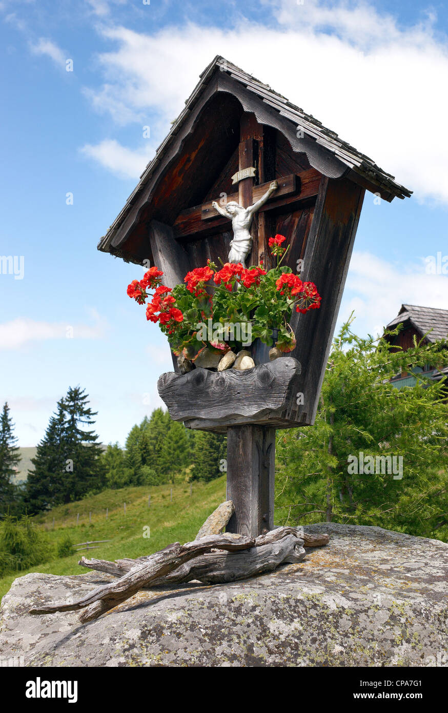 A wayside shrine on a hill in Lammersdorf, Millstatt, Austria Stock Photo