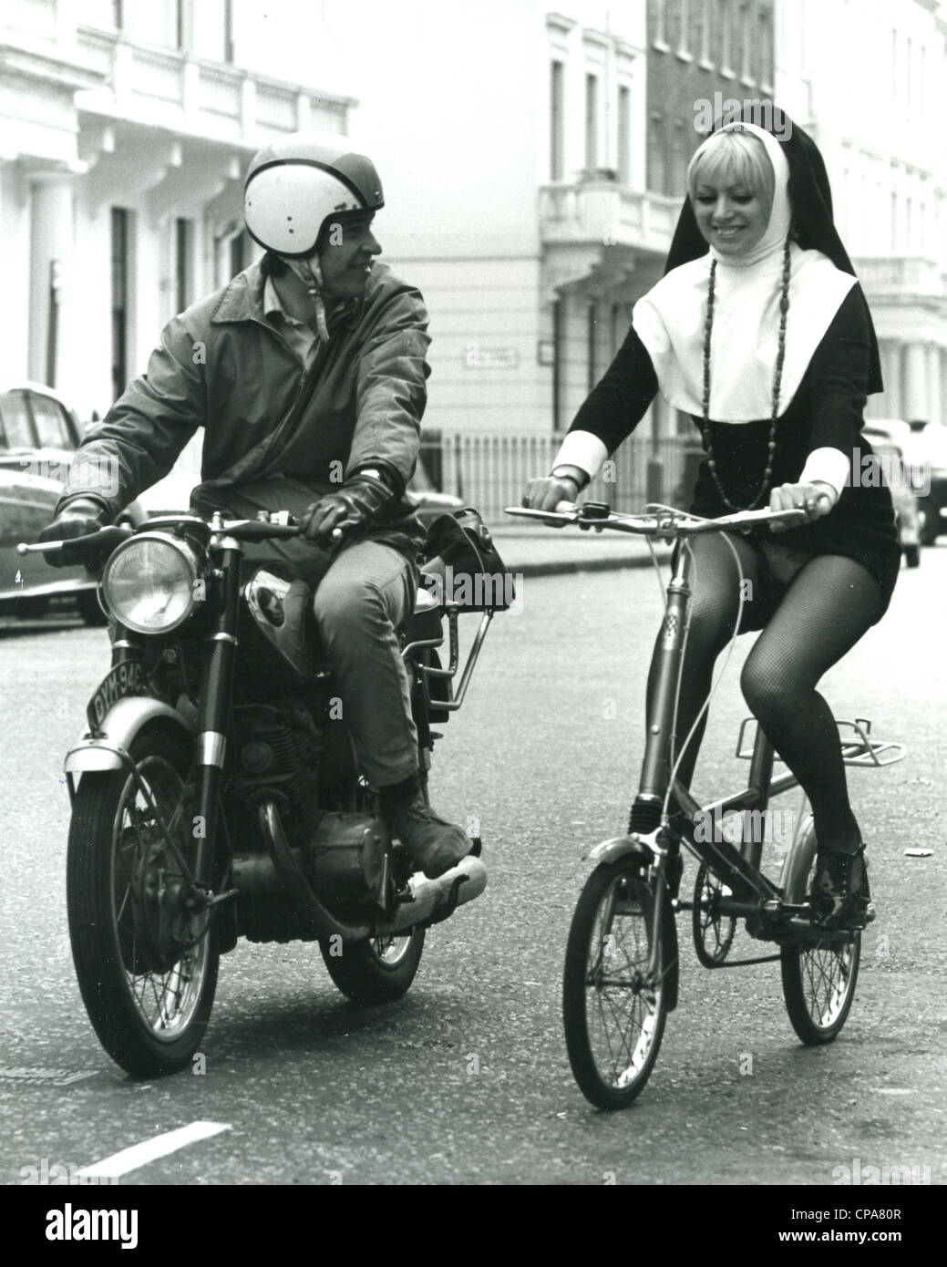 CYCLING NUN (posed by model) Photo Tony Gale Stock Photo