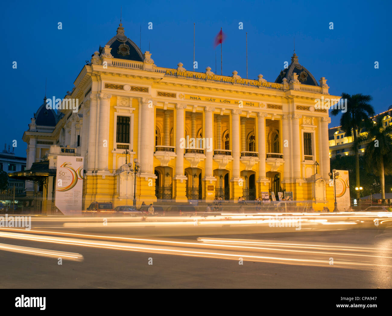 Night view of Hanoi Opera House with traffic Vietnam Stock Photo