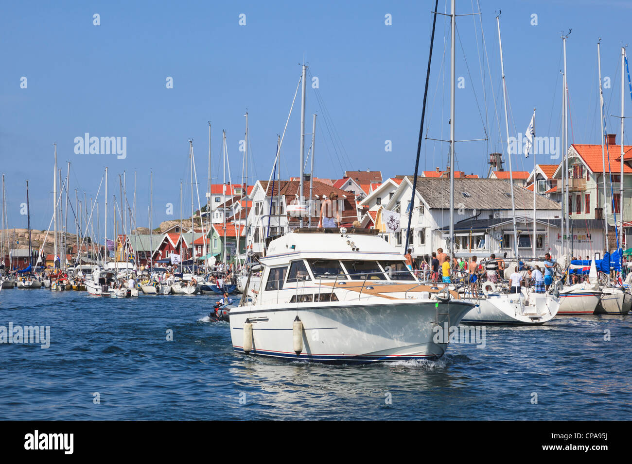 Motorboat in the bay at Smogen, on the west coast in Sweden Stock Photo ...