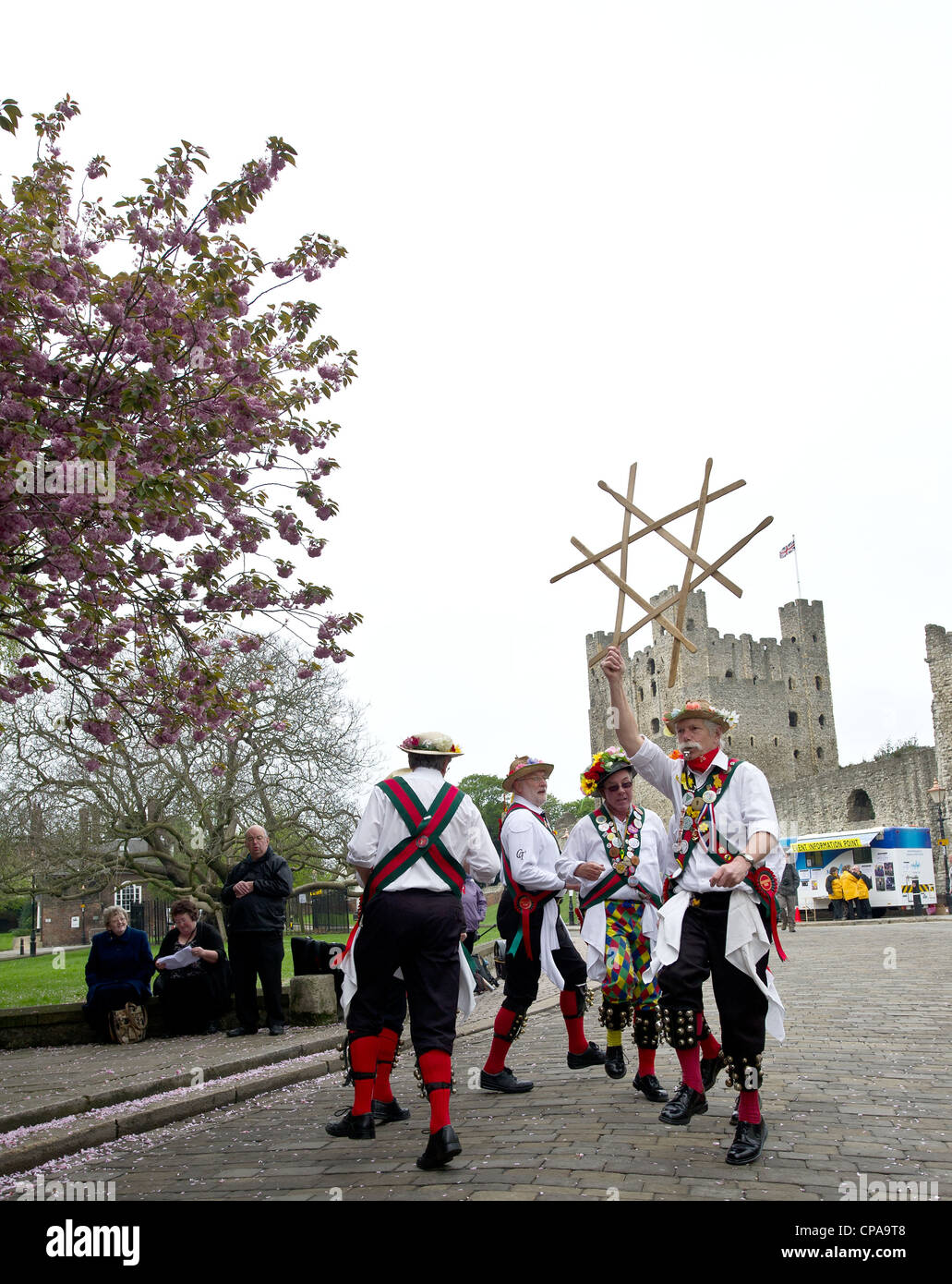 Merrydowners Morris performing a sword dance in front of Rochester Cathedral as part of the Sweeps Festival Stock Photo