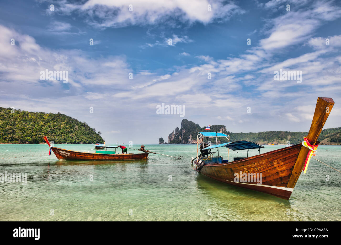 Longboats on Phi Phi Island Thailand Stock Photo