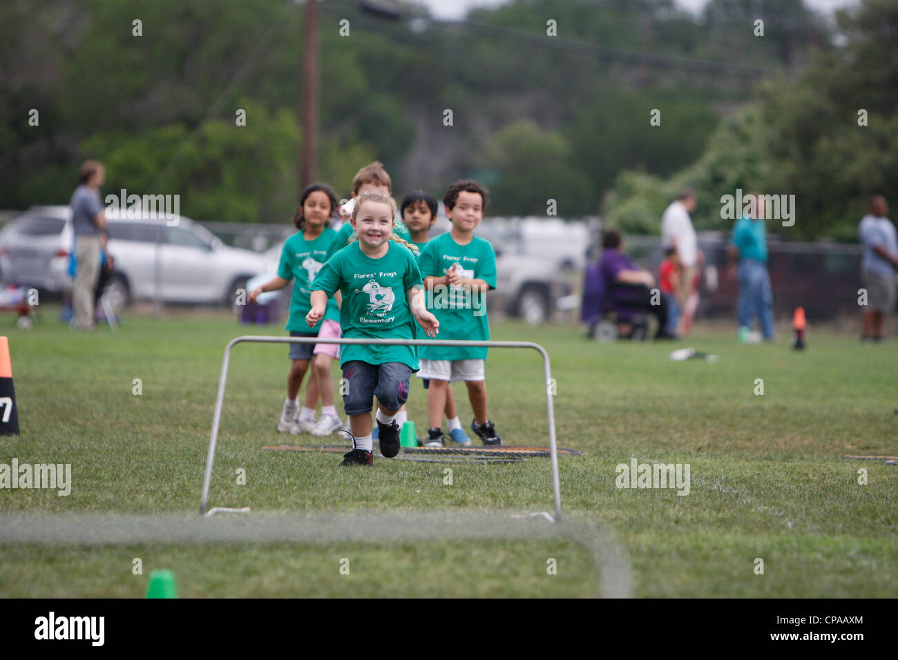 Multiethnic kindergarten age school children participate in physical
