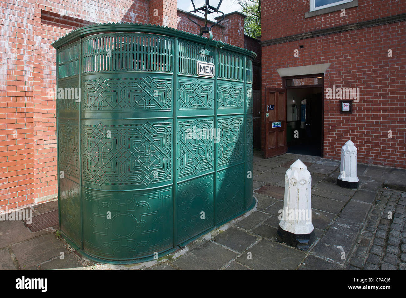 Restored double doorway Victorian street urinal at the National Tramway Village Museum, Crich, Derbyshire, UK Stock Photo