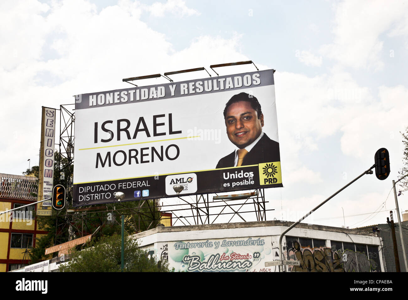 billboard above intersection in Mexico City showing candidate for Chamber of Deputies in July 1 2012 Mexican general election Stock Photo