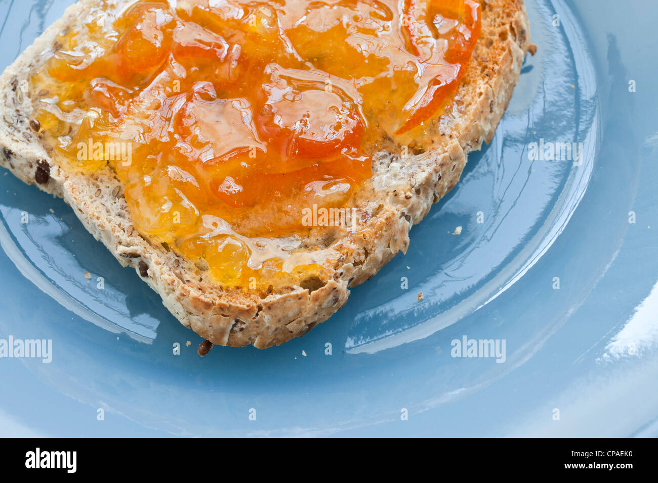 orange Marmalade on Gluten-free flax toast ( glutino Brand ) home made maramalade Stock Photo