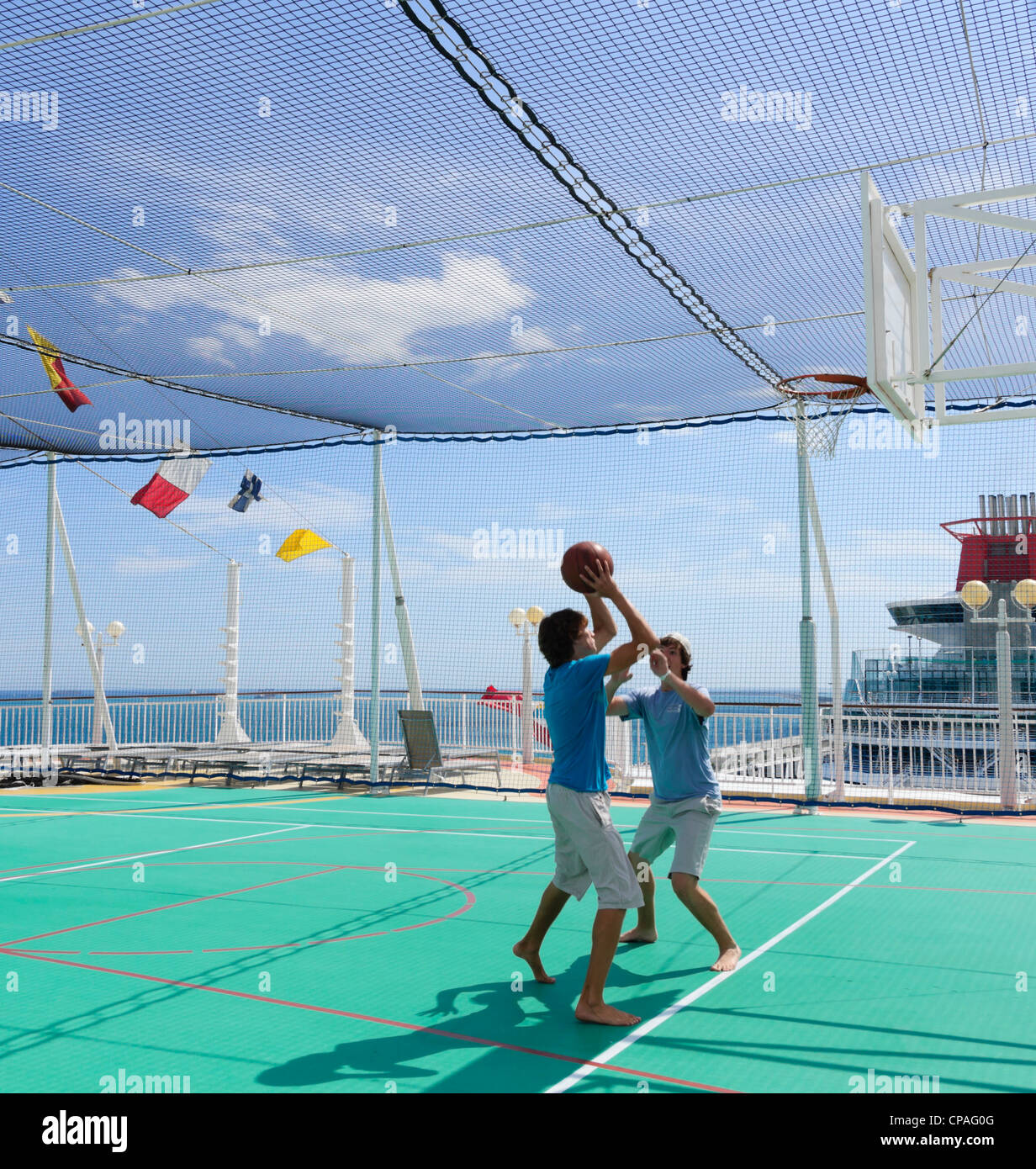 Norwegian Jade cruise ship - playing basketball on deck. US students on  Spring break Mediterranean cruise Stock Photo - Alamy