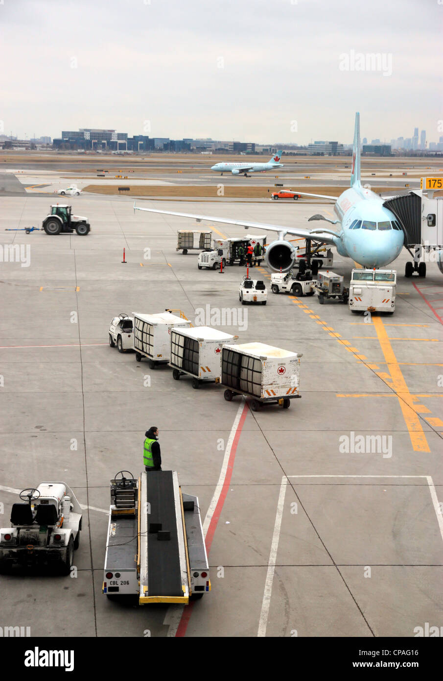 An airplane at a gate of the Toronto Pearson Airport Stock Photo