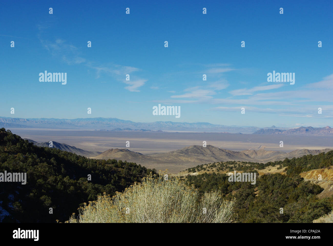 Wide view of Nevada desert from mountains of Humboldt Toiyabe National Forest Stock Photo