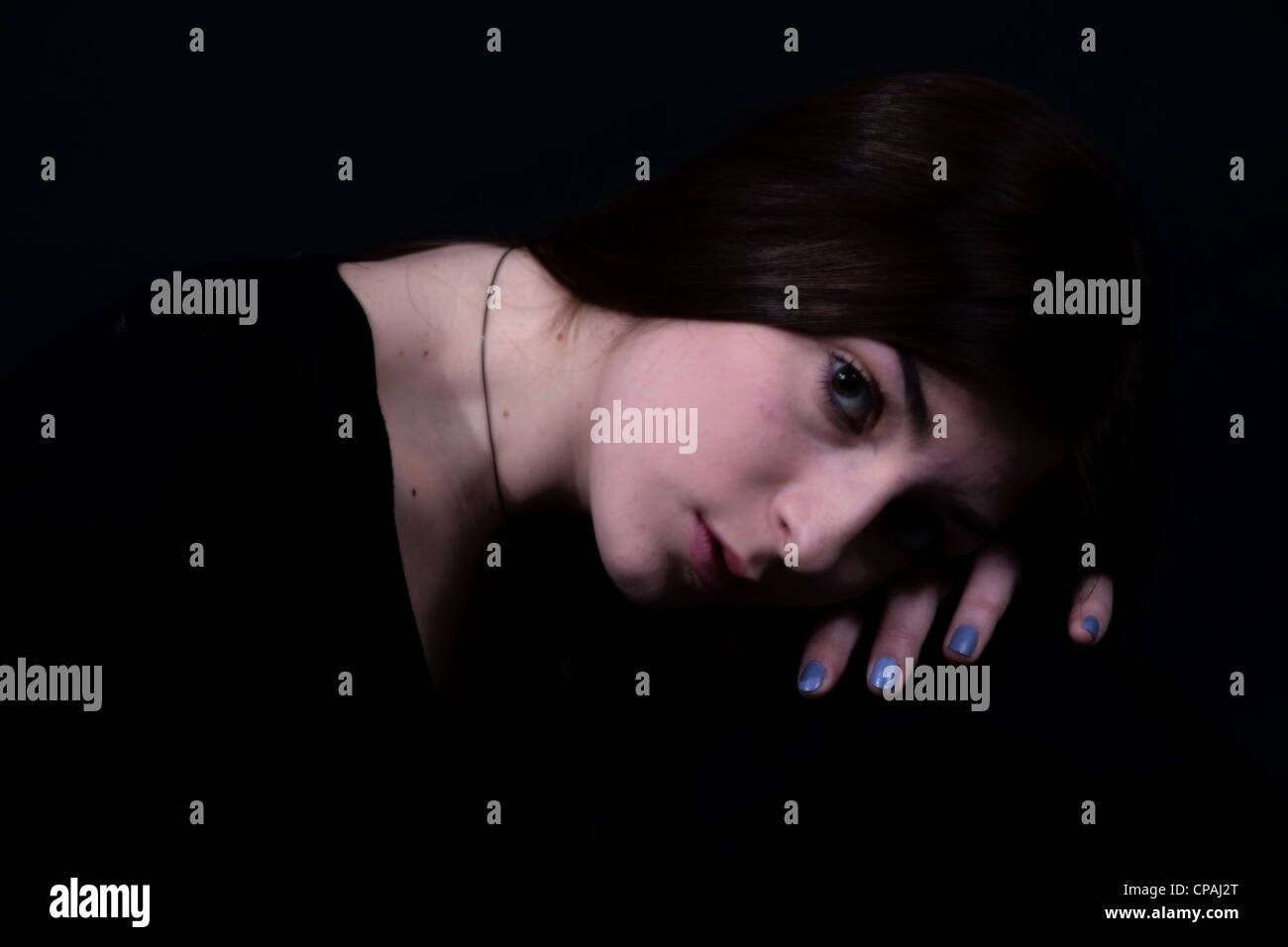 portrait of a young woman in black Stock Photo - Alamy