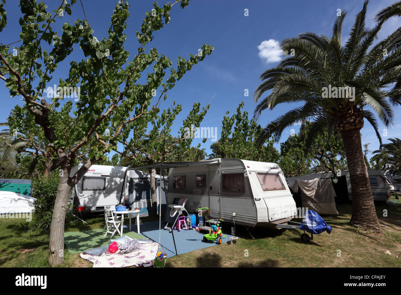 Caravan on a camping site in Spain Stock Photo Alamy