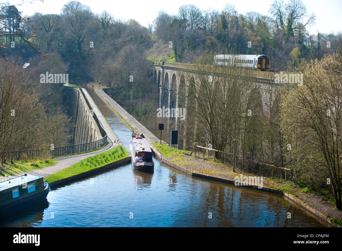Chirk Aqueduct and viaduct with canal boat and train, North Wales, UK Stock Photo