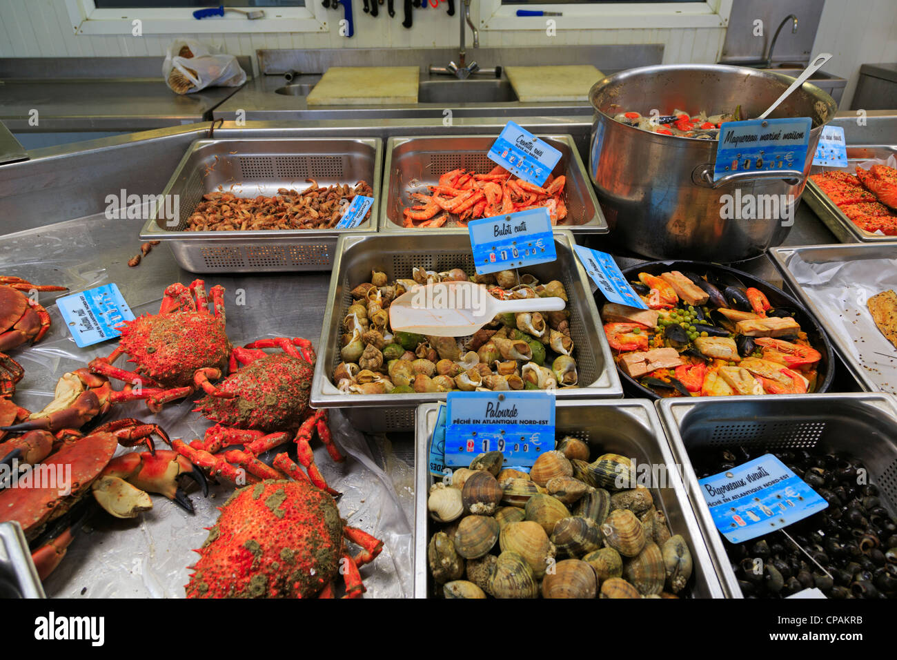 Prepared shellfish at the market in Honfleur, France. Stock Photo