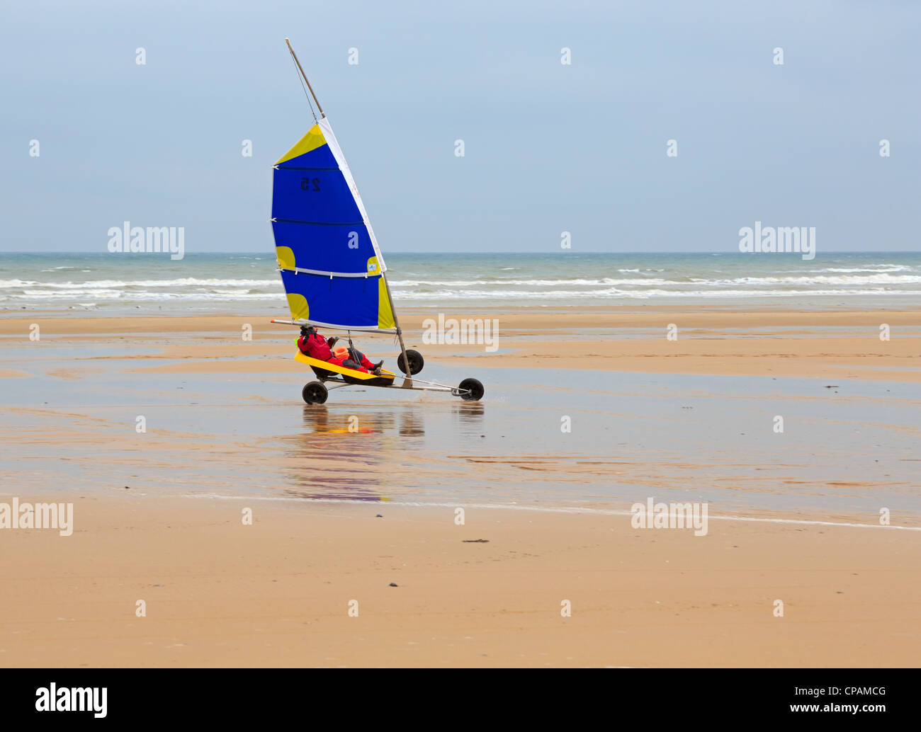 Land sailing on Omaha Beach in Normandy. The long sandy beach is ideal for sand yachts. Stock Photo