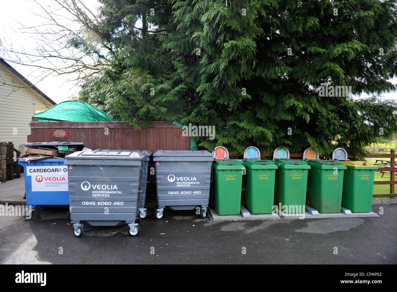 A row of green recycling bins UK Stock Photo Alamy