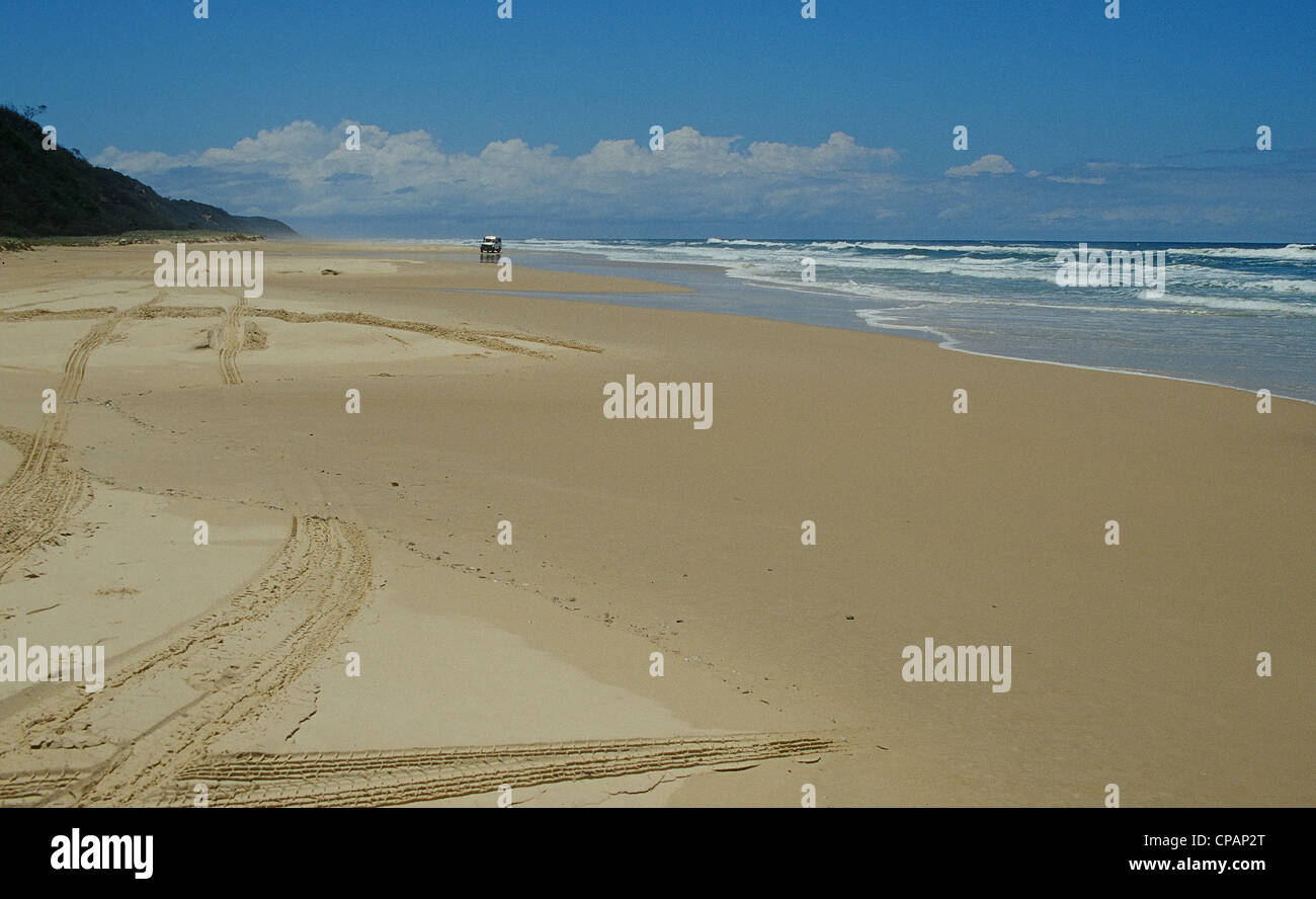 At low tide, the Eastern Beach of Fraser island in Queensland serves as a coastal road Stock Photo