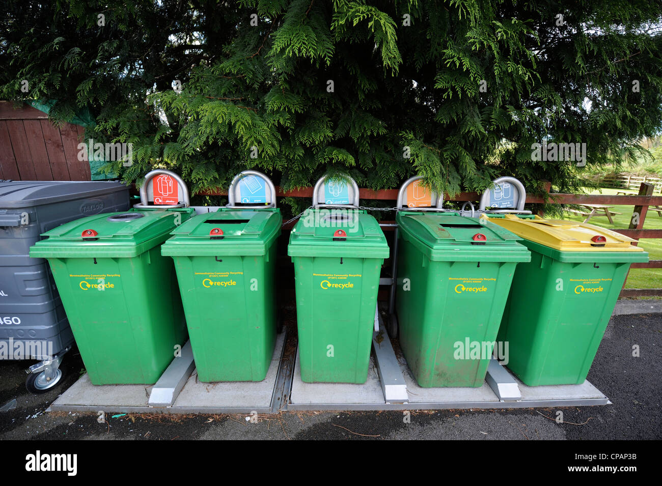 A row of green recycling bins UK Stock Photo Alamy
