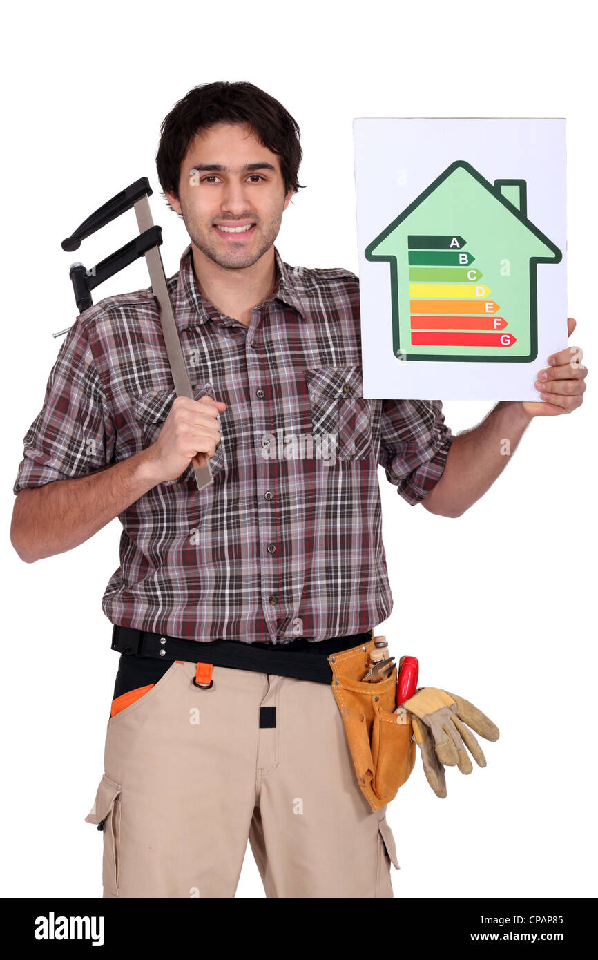 Carpenter with calipers and energy rating guide Stock Photo Alamy