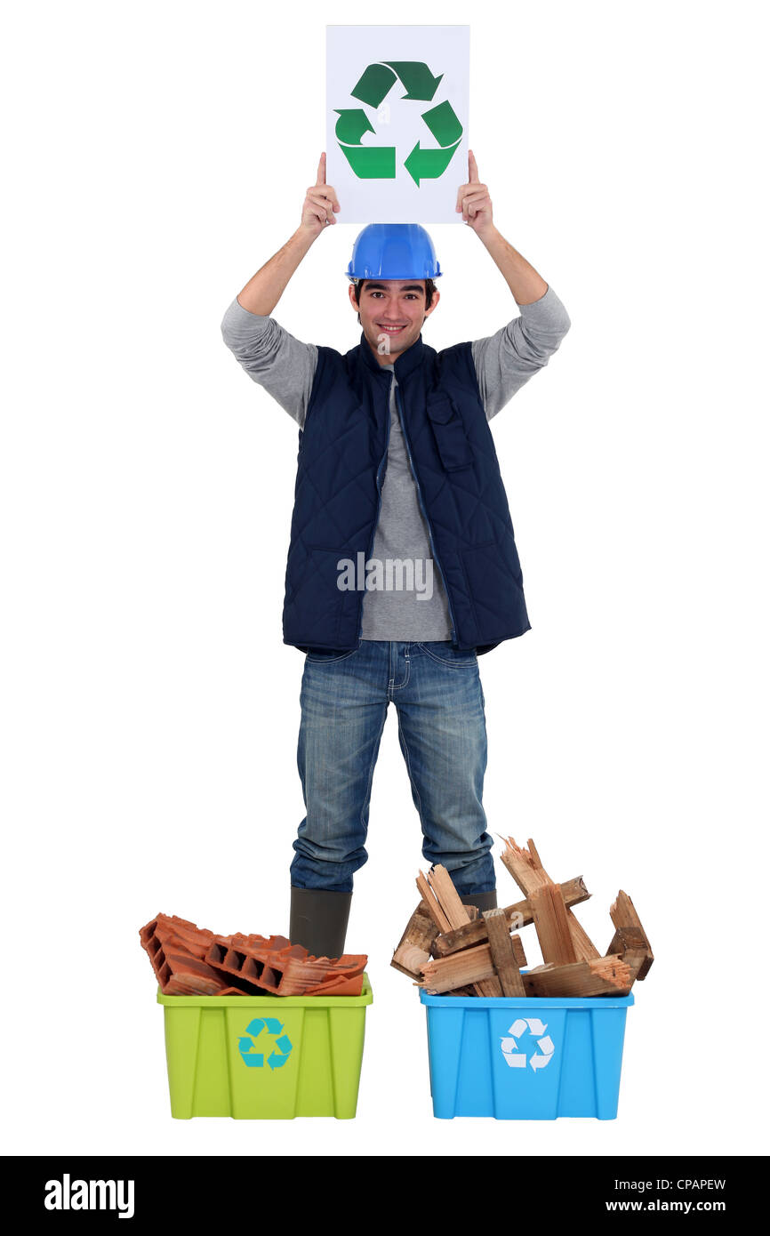 Young tradesman promoting recycling Stock Photo
