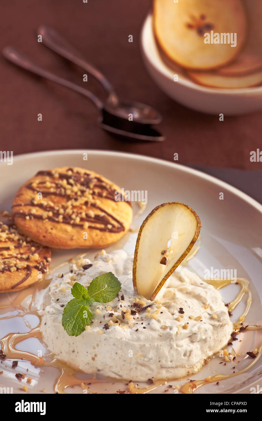Pear mousse, cream, ricotta and honey Stock Photo