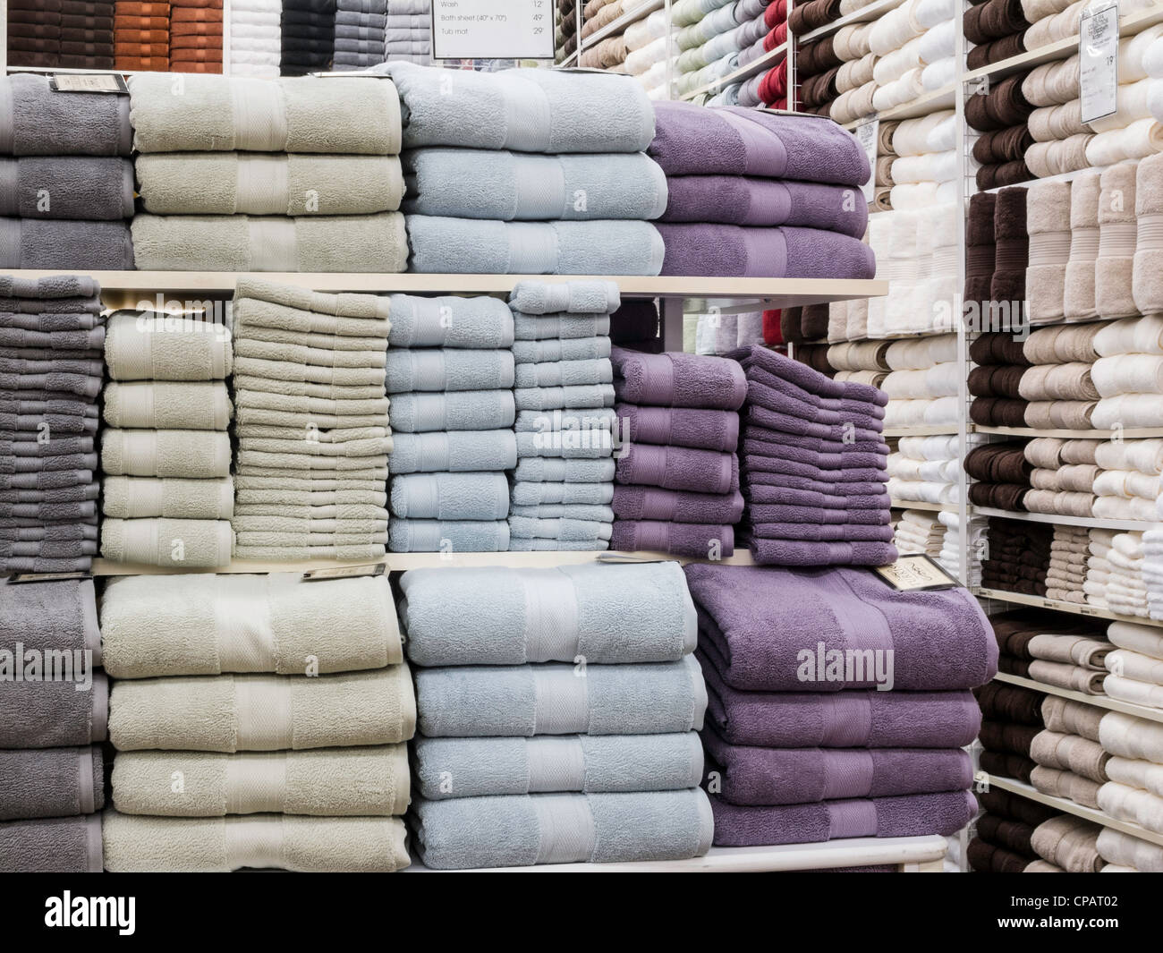 Display sale shelves bath towels hi res stock photography and