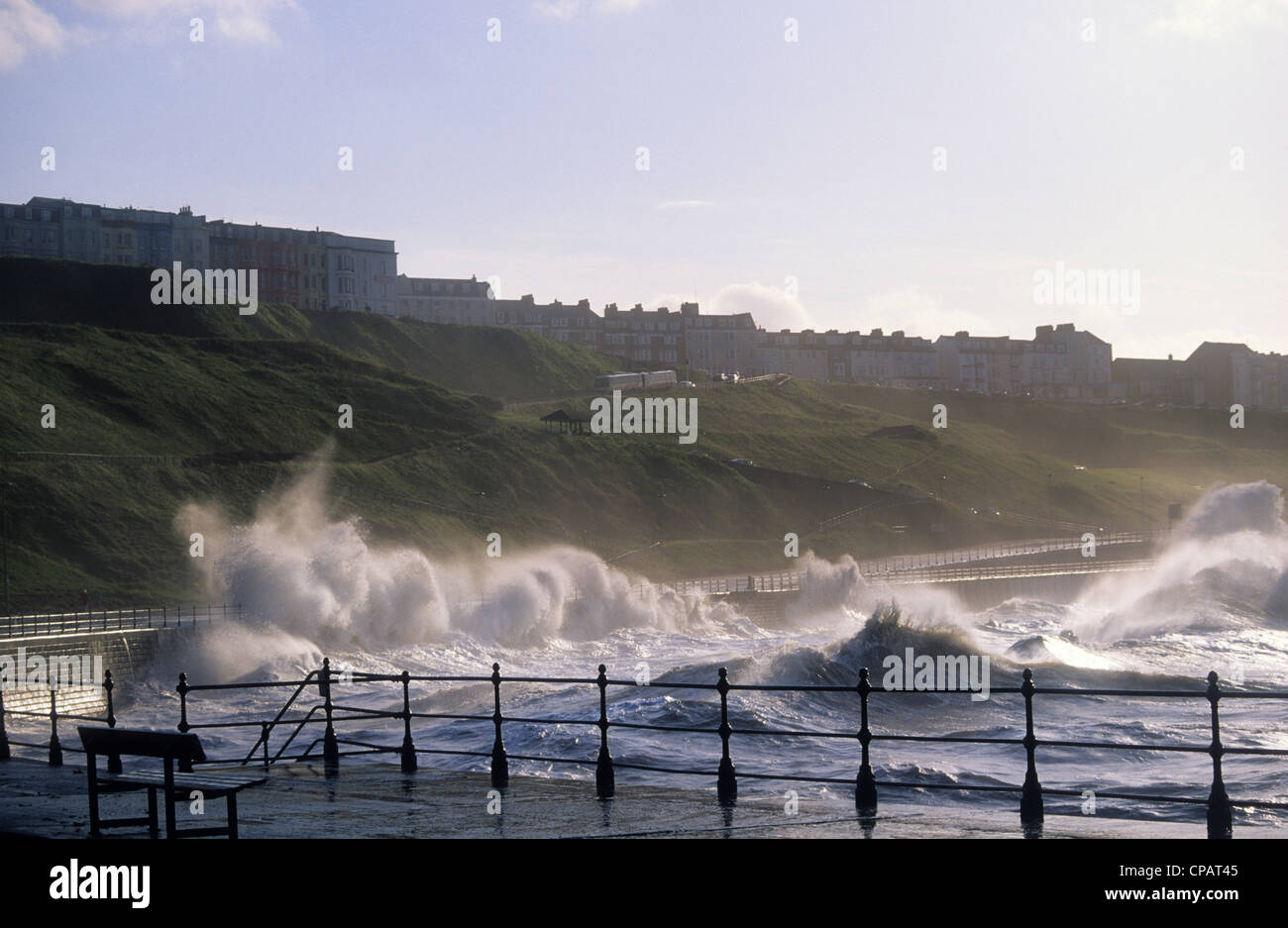giant waves crashing over sea defences at the north bay scarborough during storm yorkshire uk Stock Photo