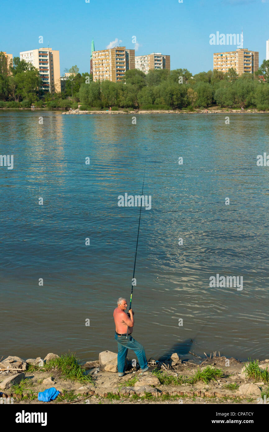 Man fishing on Vistula river in Warsaw, Poland Stock Photo