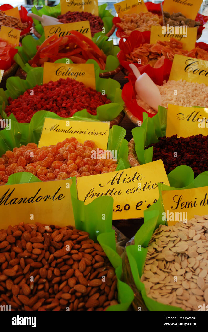 Various edible seeds and fruits on sale at the market, Italy Stock Photo