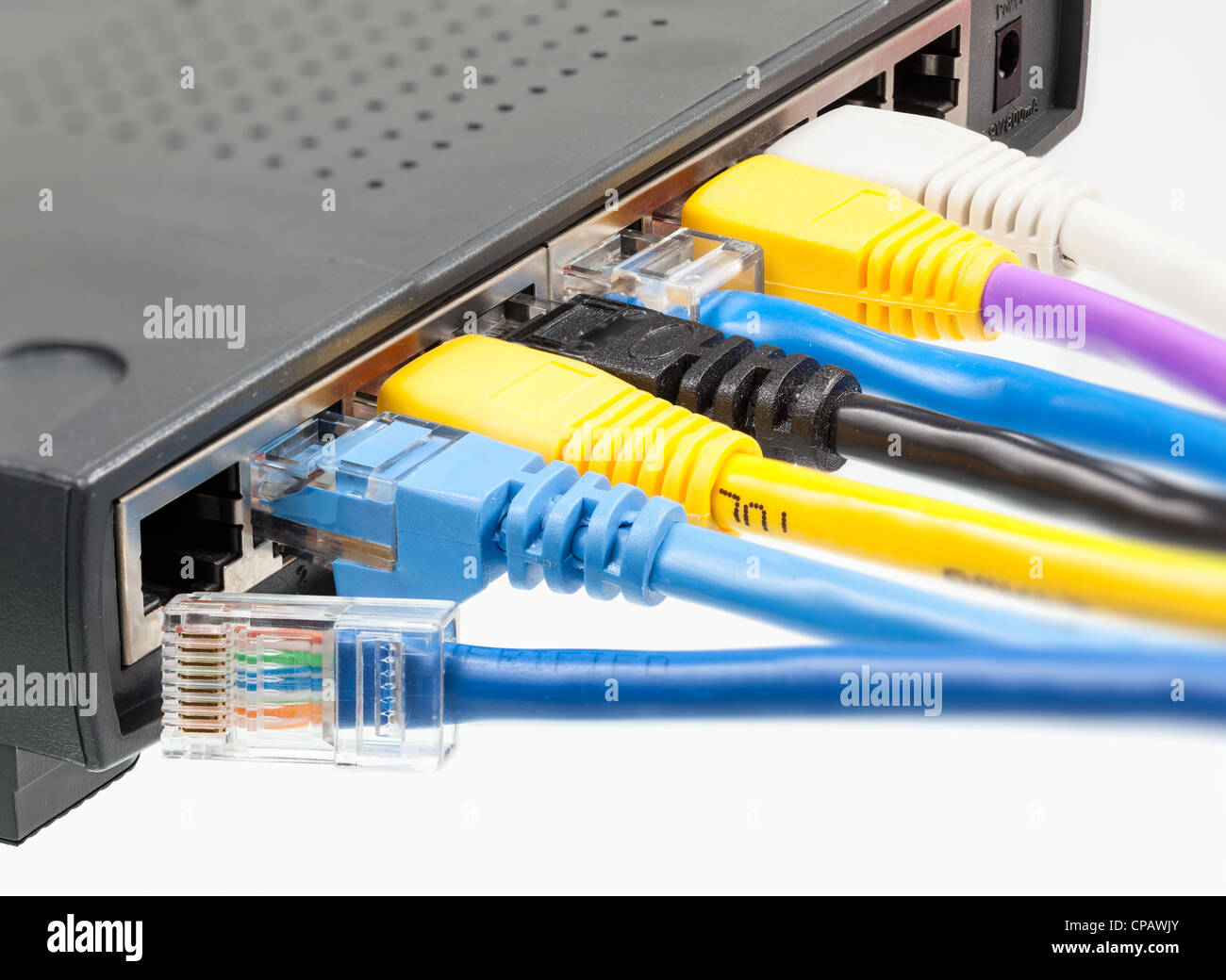 Single cat5 or cat5e cable unplugged from internet router or switch used in  a lan or personal computer network Stock Photo - Alamy