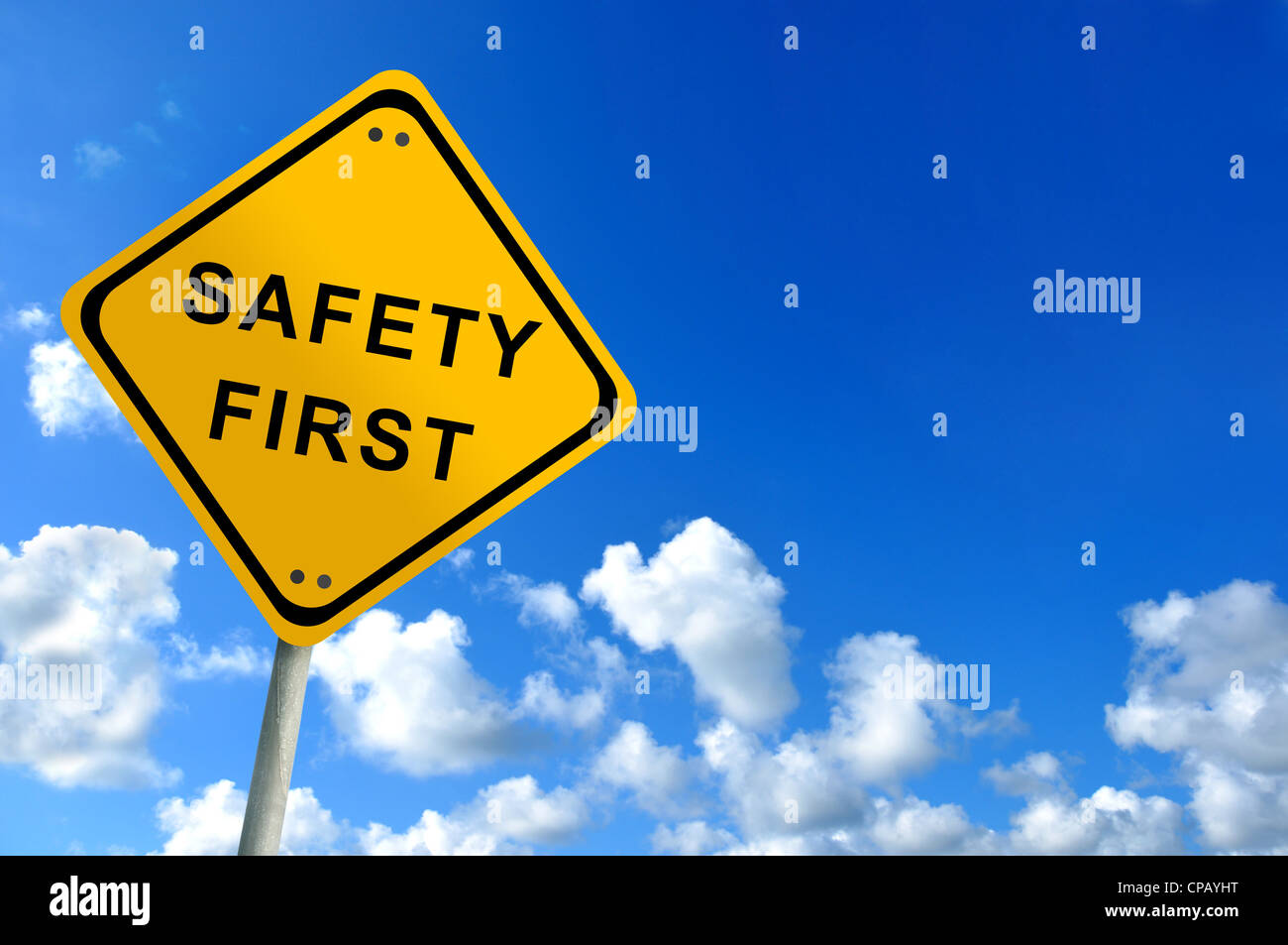 safety first traffic sign on bluesky Stock Photo