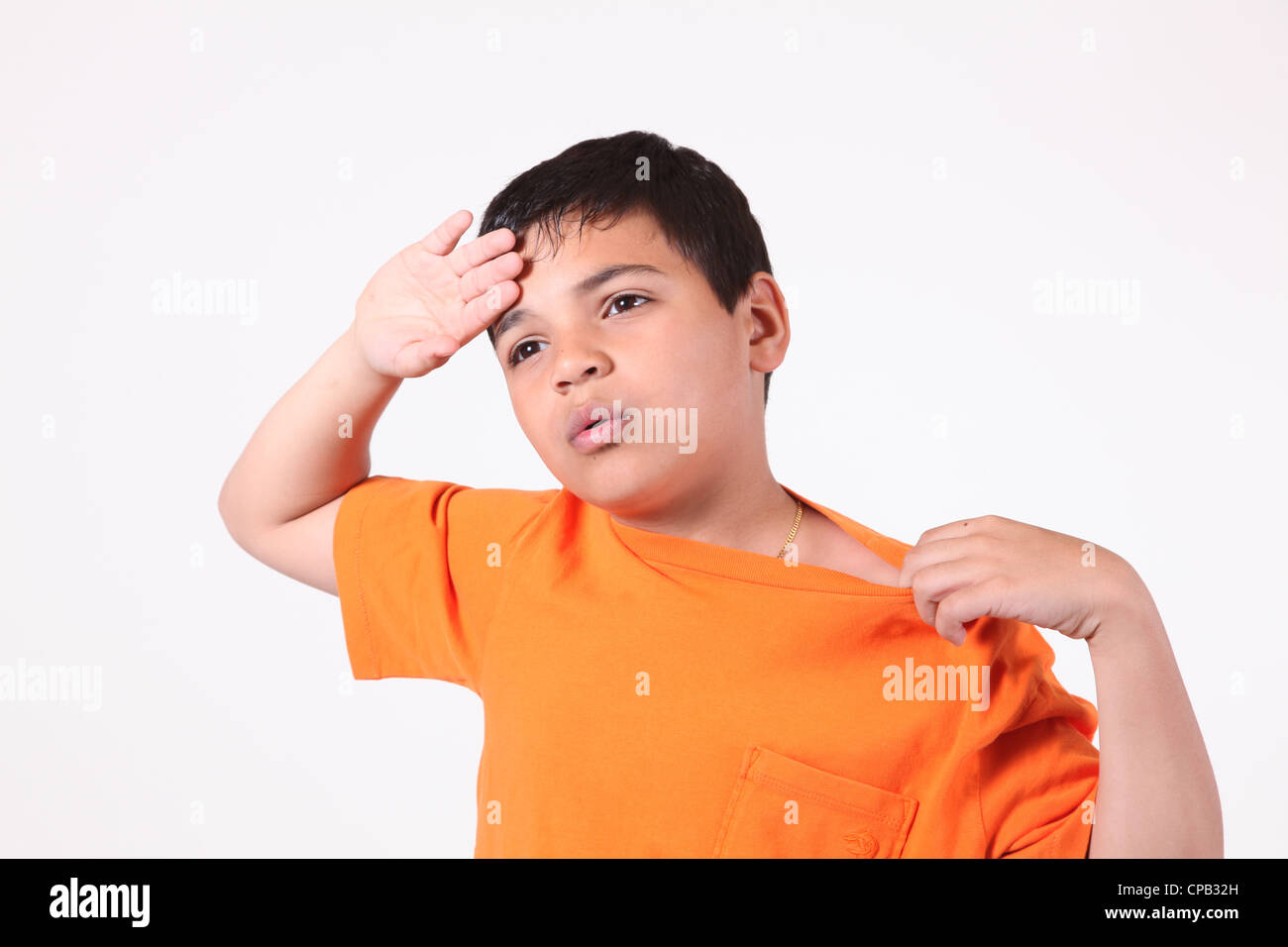 https://c8.alamy.com/comp/CPB32H/studio-shot-of-a-boy-wiping-sweat-off-his-brow-CPB32H.jpg