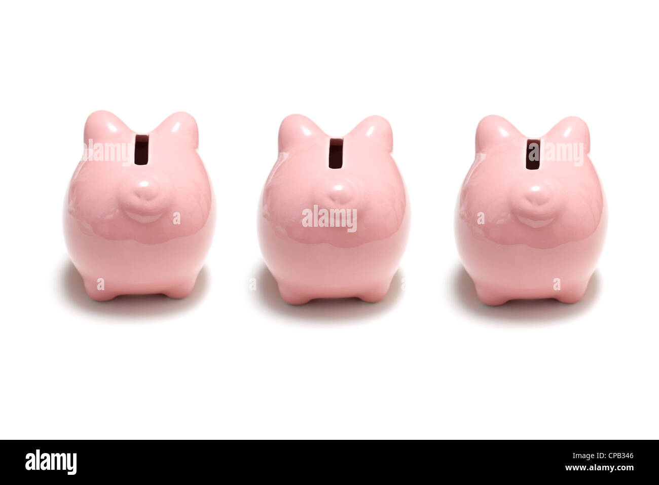 Piggy banks turning their back Stock Photo