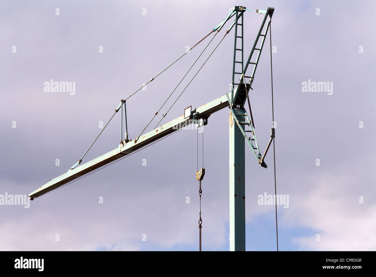 A big crane in a cloudy day Stock Photo - Alamy