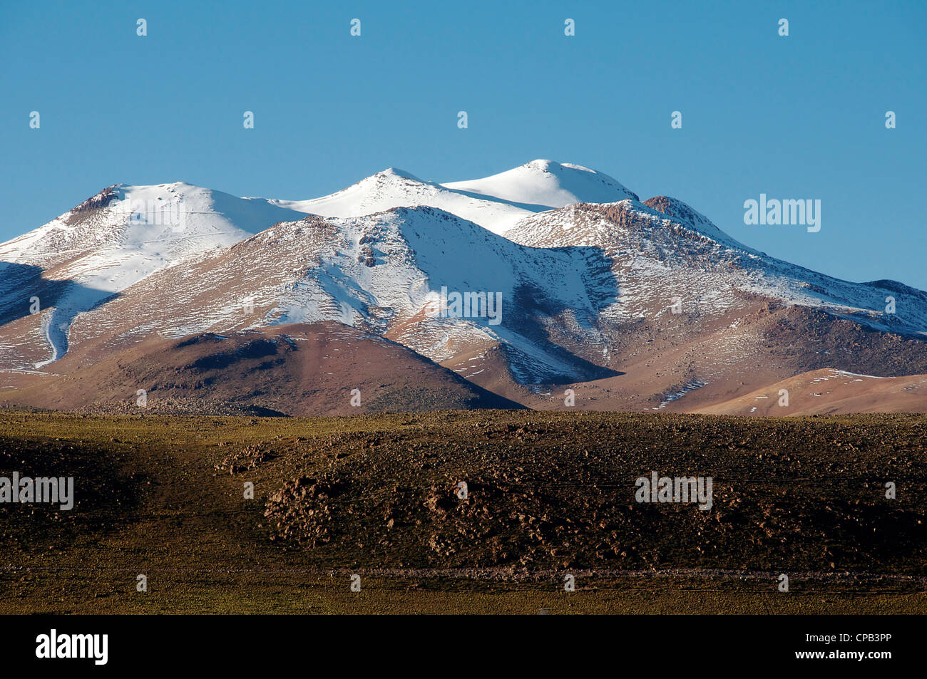 Snowcapped mountains Tatio Geysers Chile Stock Photo