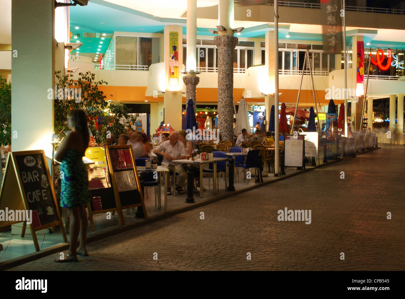 Bars and restaurants along the marina promenade at night, Benalmadena