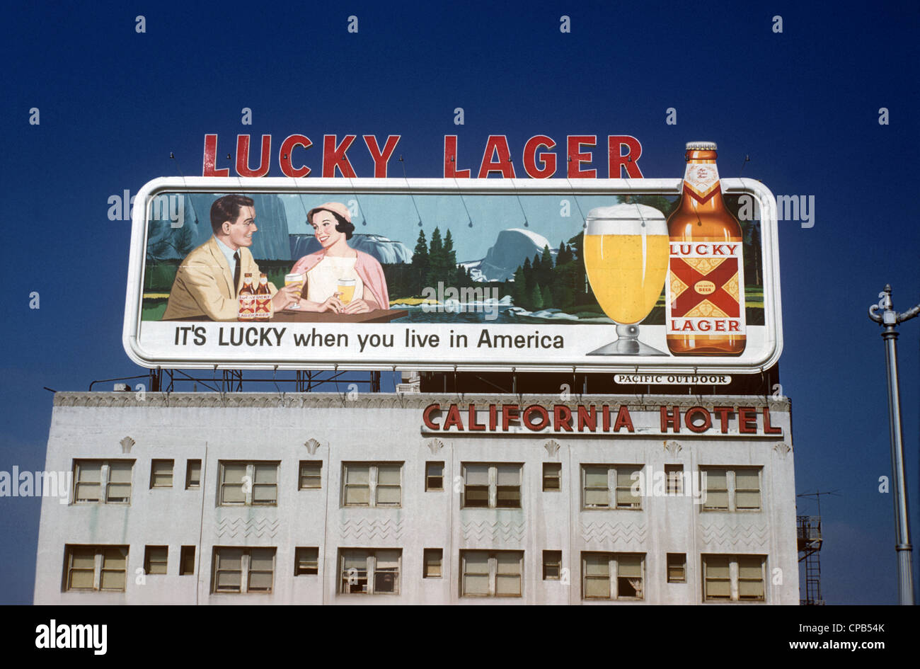 Beer billboard on hotel rooftop in Long Beach, CA circa 1959 Stock