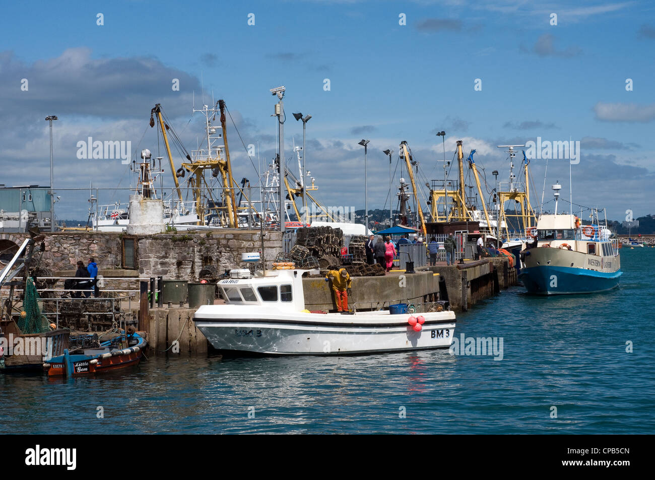 Brixham Harbour,Trawler Fleet,Devon,at the seaside,storm brewing, abstract, background, bobber, buoy, catch, close-up, color, de Stock Photo