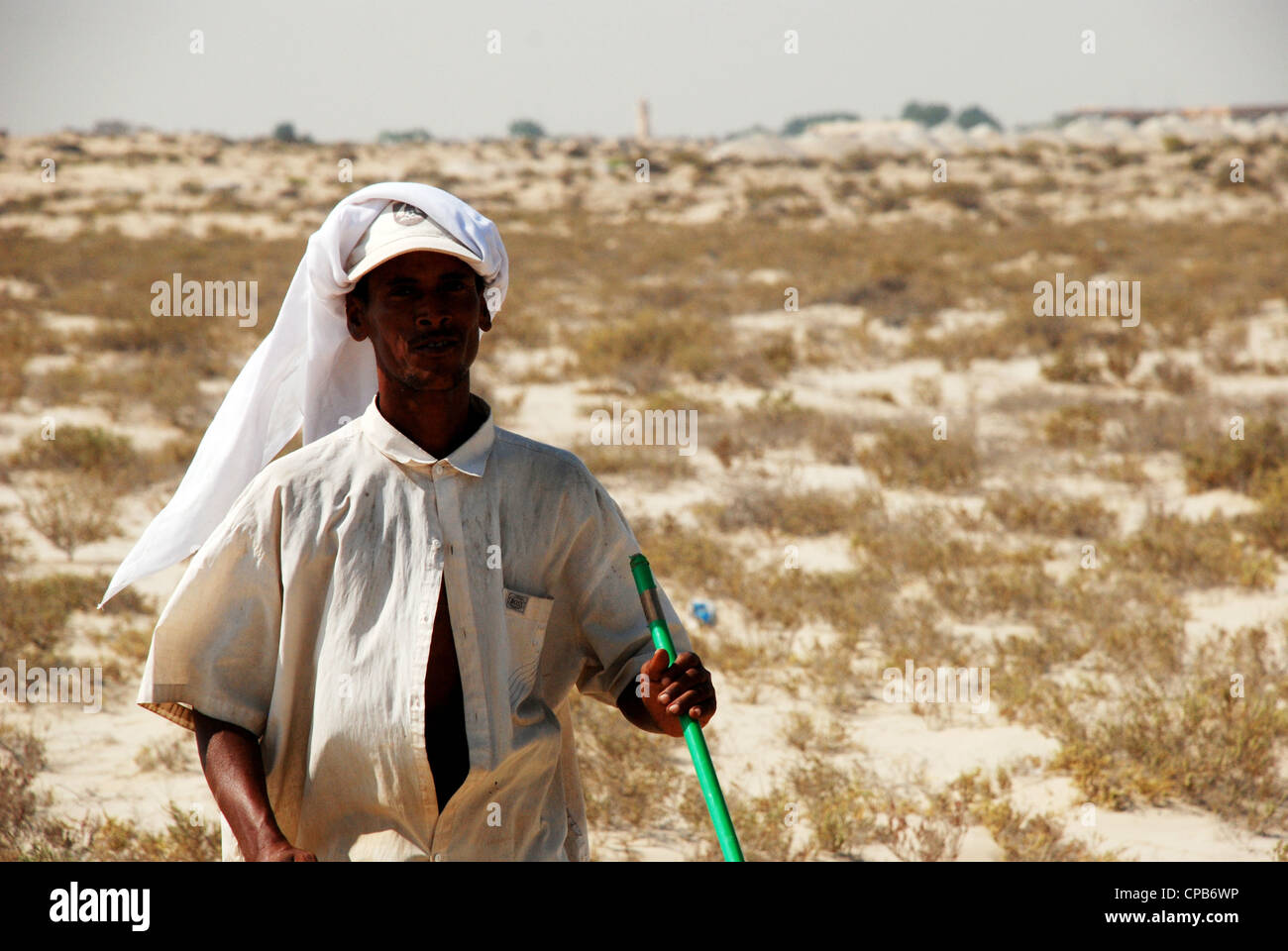 Arabic herdsman in Dubai U A E Stock Photo
