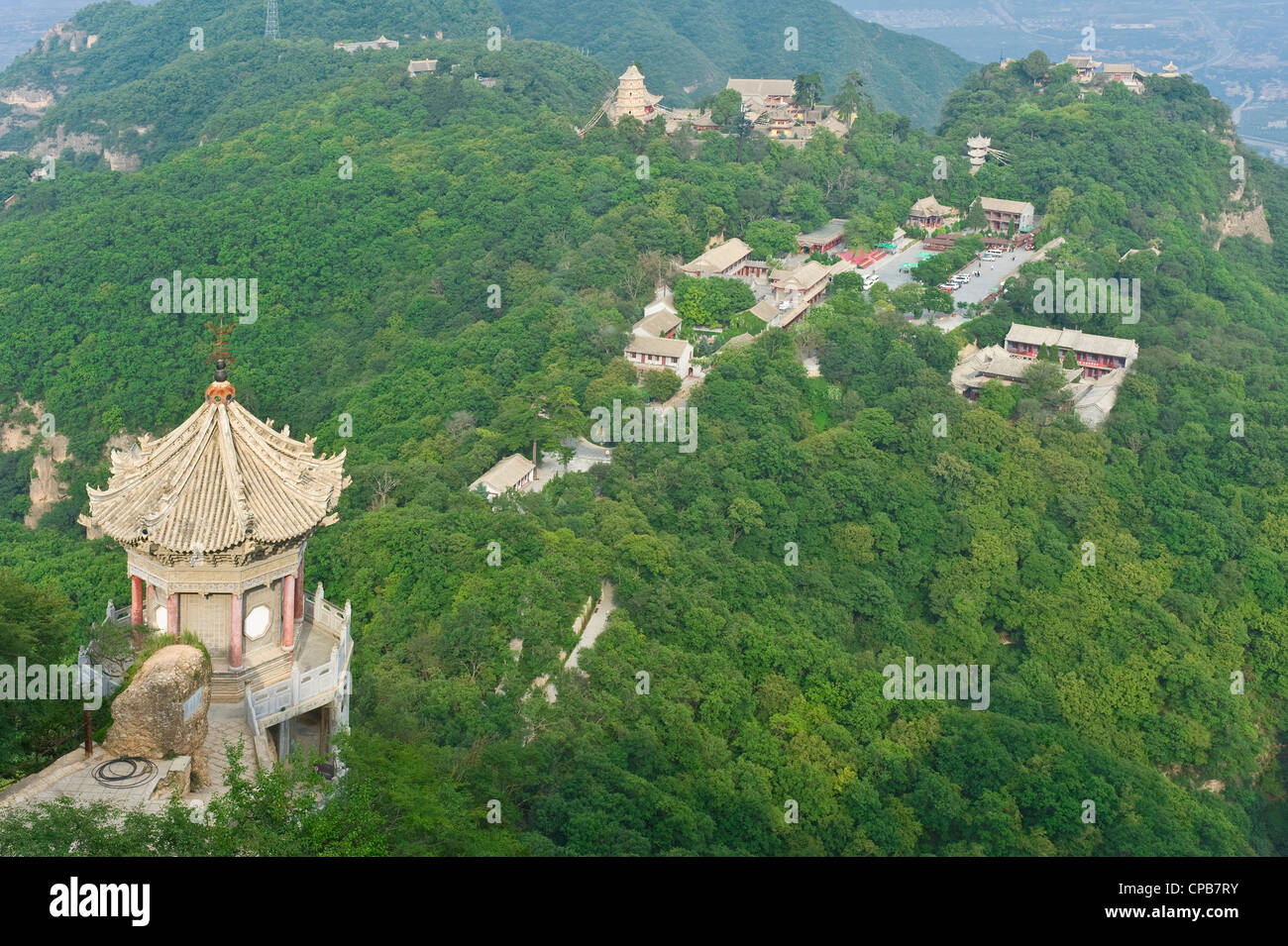 View from thunderclap peak on Mount Kongtong with Three Religions Temple in the foreground looking towards the tourist Center. Stock Photo