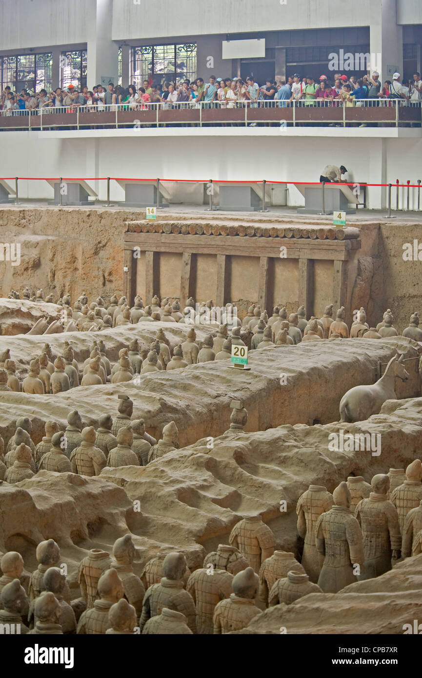 A view inside pit no.1 showing the Terracotta Army and the viewing area for visitors. Stock Photo