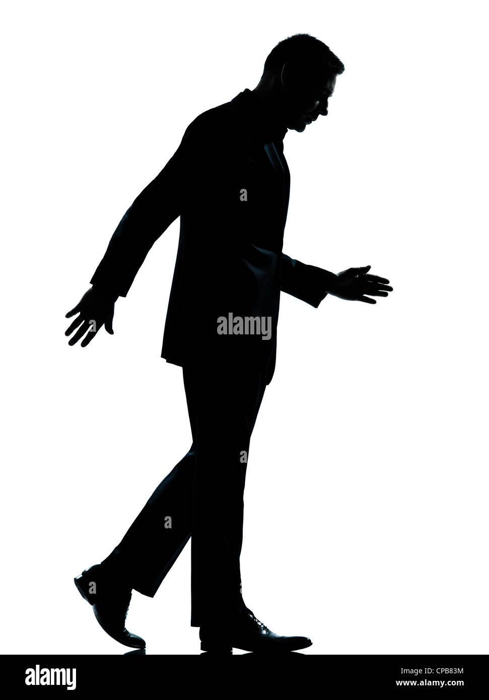 man walking silhouette side