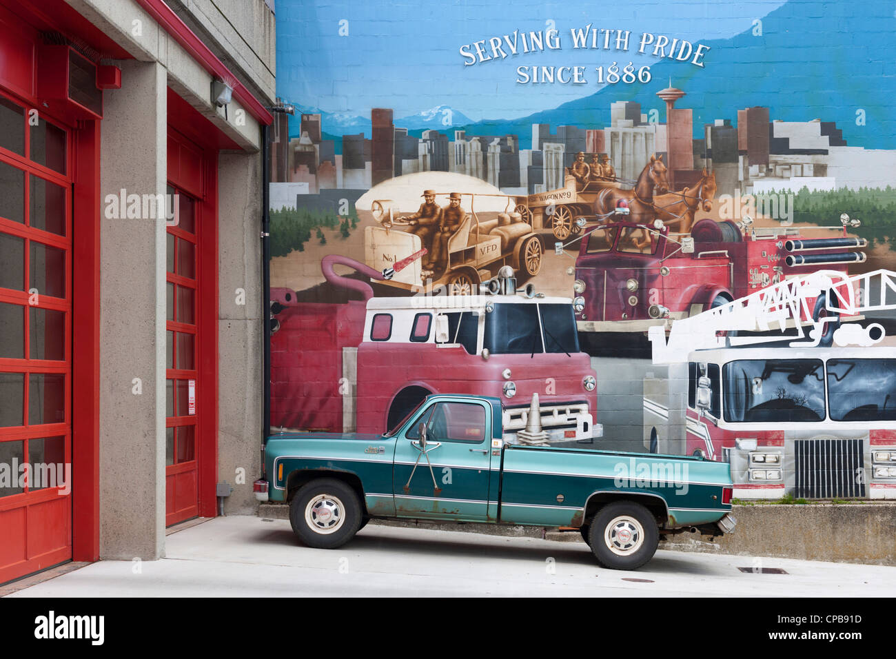 Old Pickup truck & Fire Hall Mural, Vancouver Stock Photo