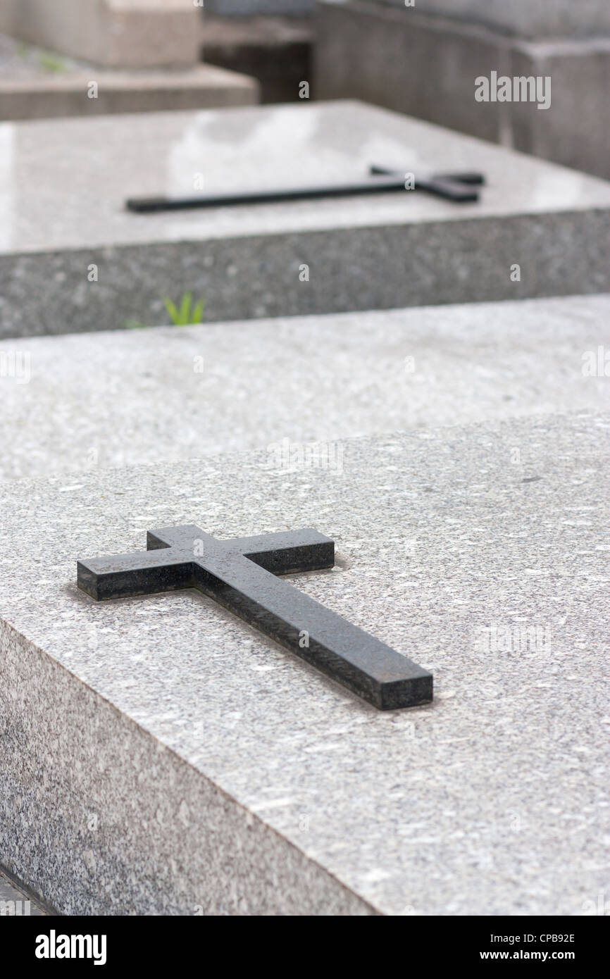 Christian grave with cross on the vault Stock Photo
