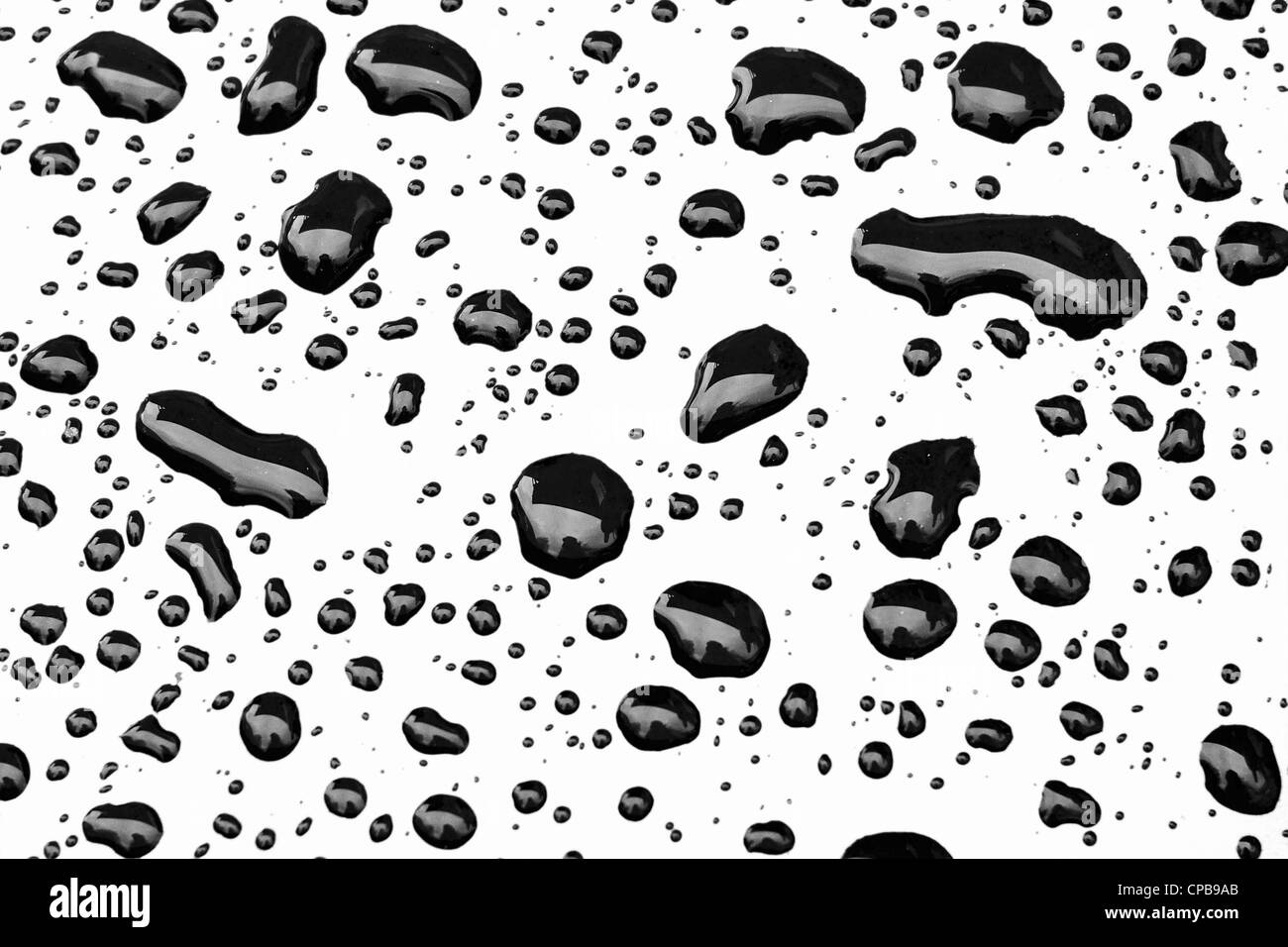 Raindrops on a metal plate. Stock Photo