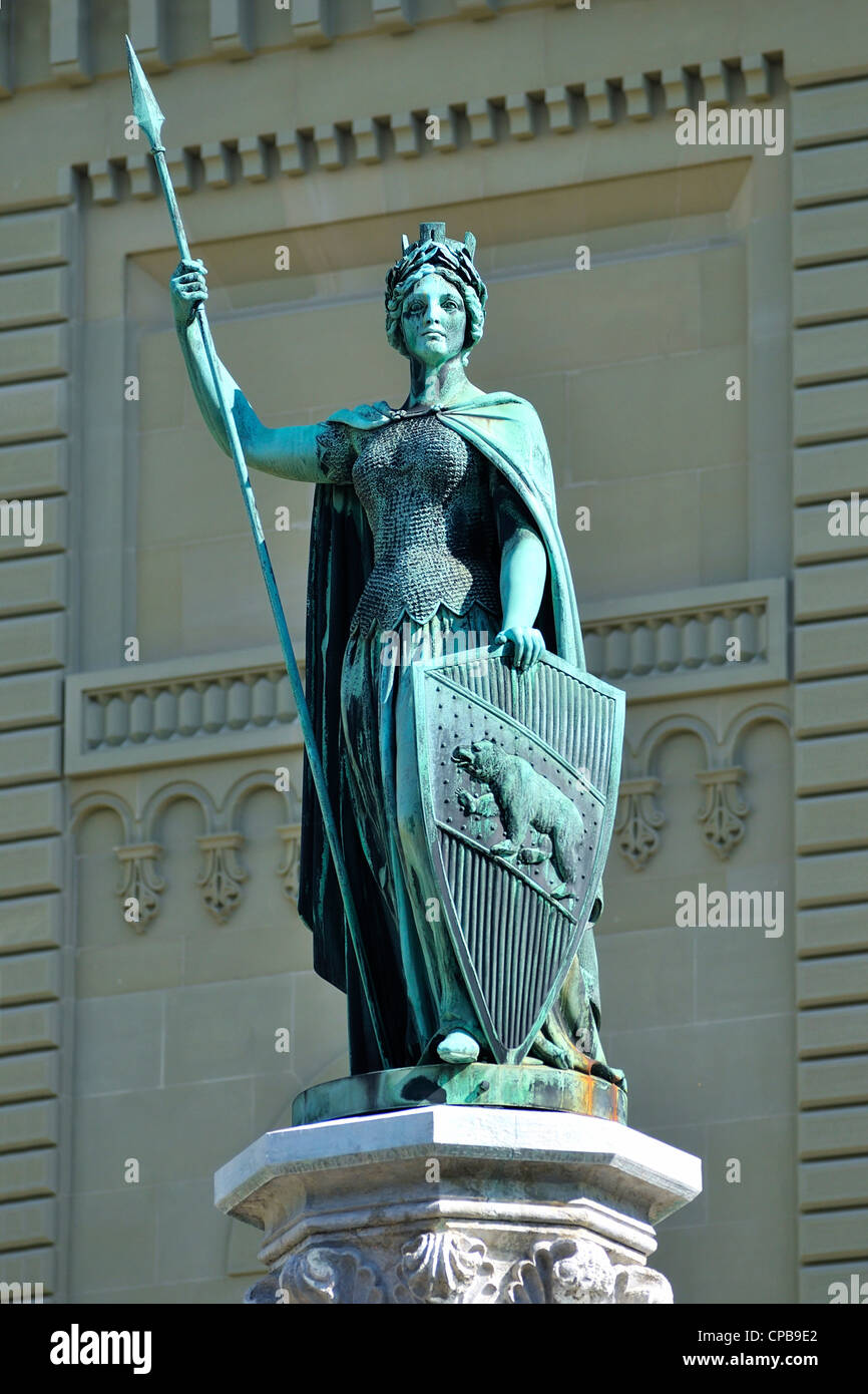 Statue of Berna, a personification of the city of Bern, in front of the Federal Palace West, Bern, Switzerland. Stock Photo