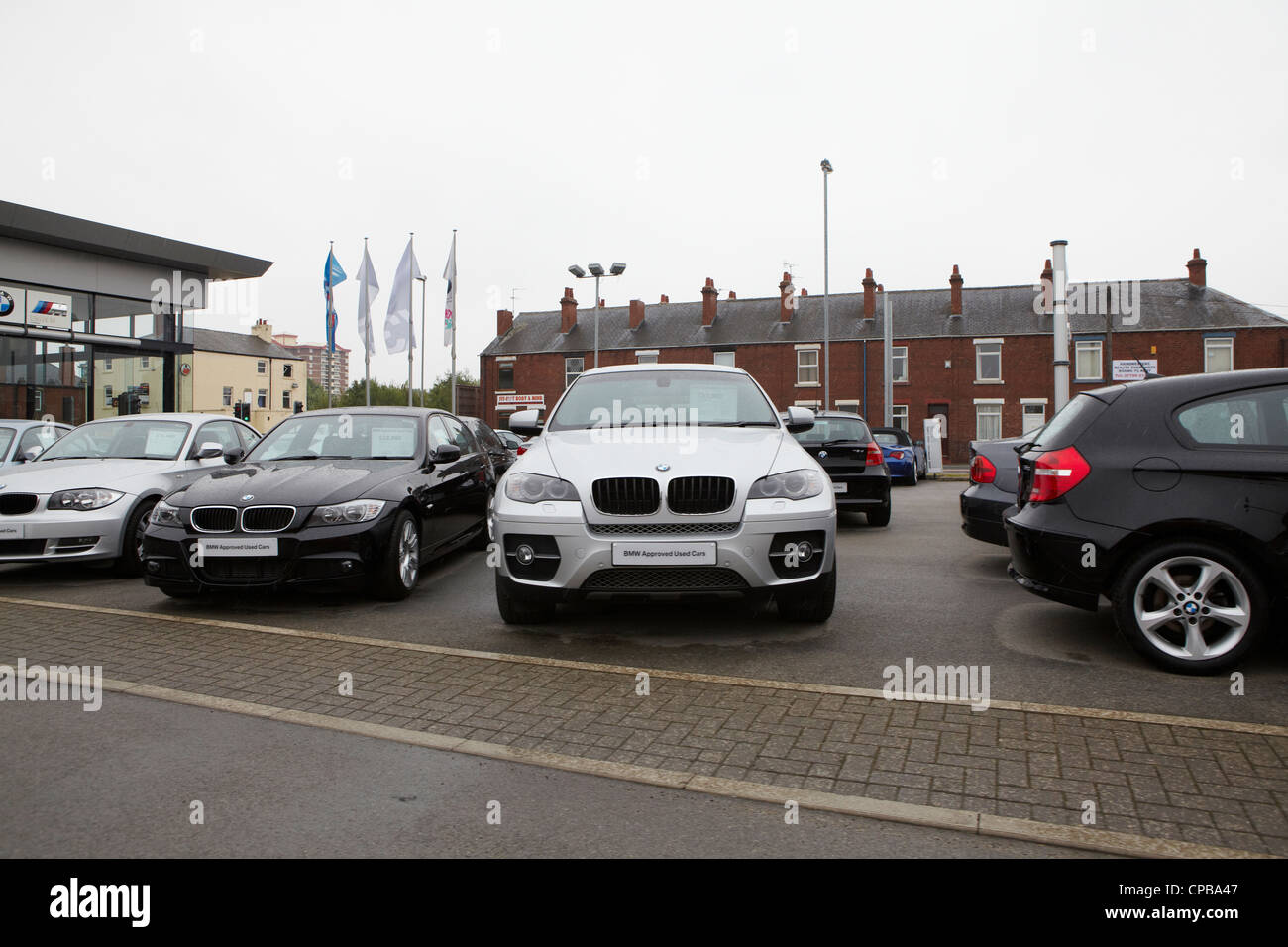 BMW cars on car dealer forecourt Stock Photo