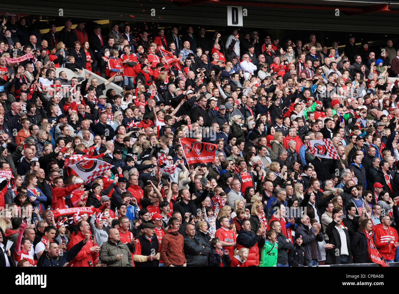 Fans behind the goal (North Stand) at The Valley, he day Charlton Athletic were crowned champions of league 1. Stock Photo